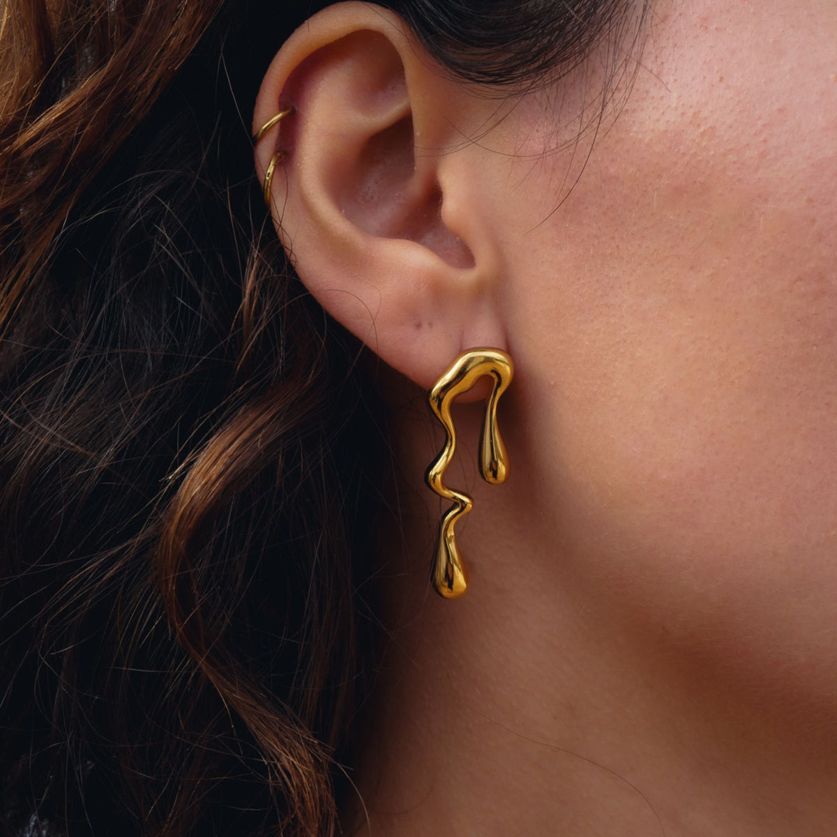 mismatched earrings